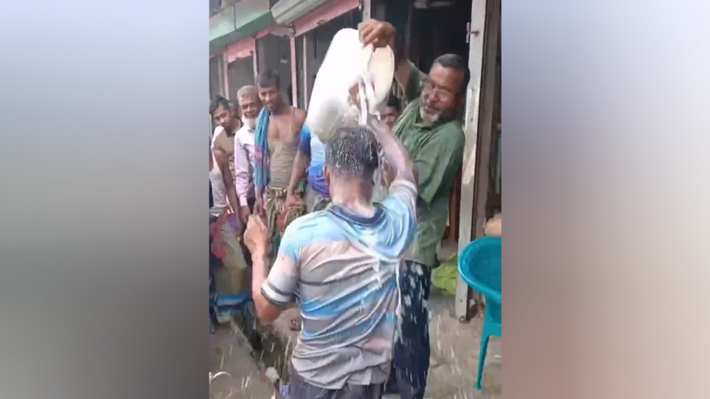 লালমোহনে বিক্রেতার মাথায় পানি মেশানো দুধ ঢাললেন পরিদর্শক